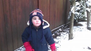 Grandson Zach and his first real experience to play in snow. Grandson Zach and his first real experience to play in snow.