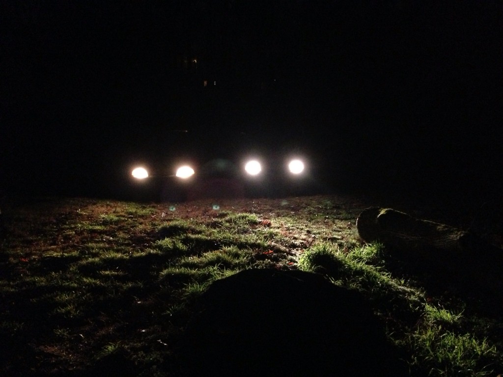 Plastic on left, Sealed Beam glass on right.